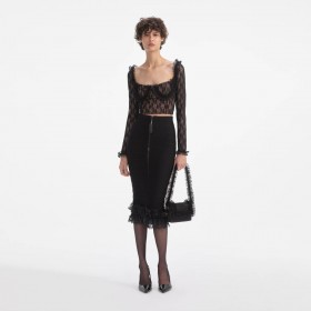  Top con volant in pizzo nero da donna | Self Portrait Tops